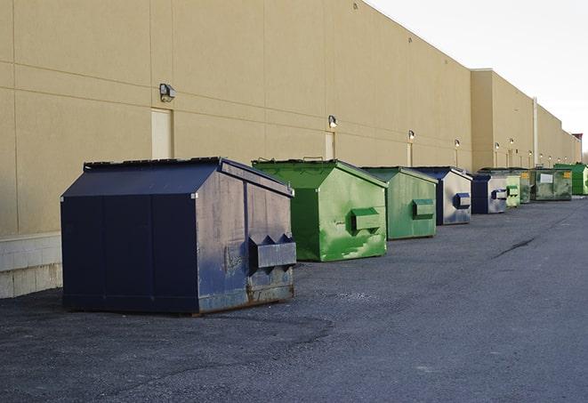 waste disposal bins at a construction zone in Auburndale, MA